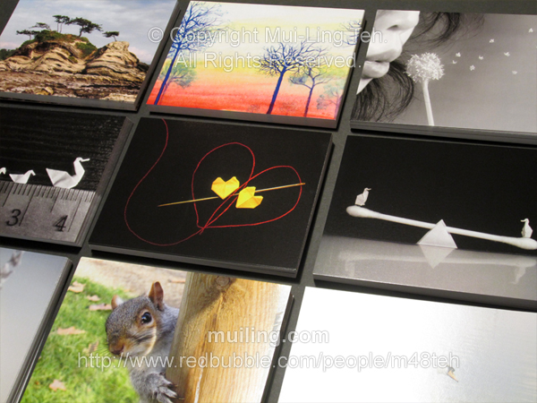 Various postcards featuring art and photography by Mui-Ling Teh