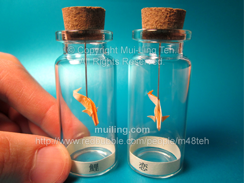 Minature origam koi fish in a bottle by Mui-Ling Teh