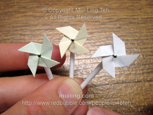 Cute little origami pinwheels by Mui-Ling Teh that can spin when blown on.